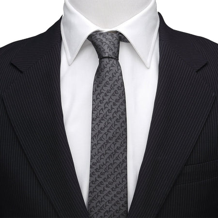 Close up of woven Klingon alphabet characters on gray silk tie