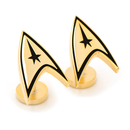 Close-up of the Delta Shield insignia showing the polished gold finish