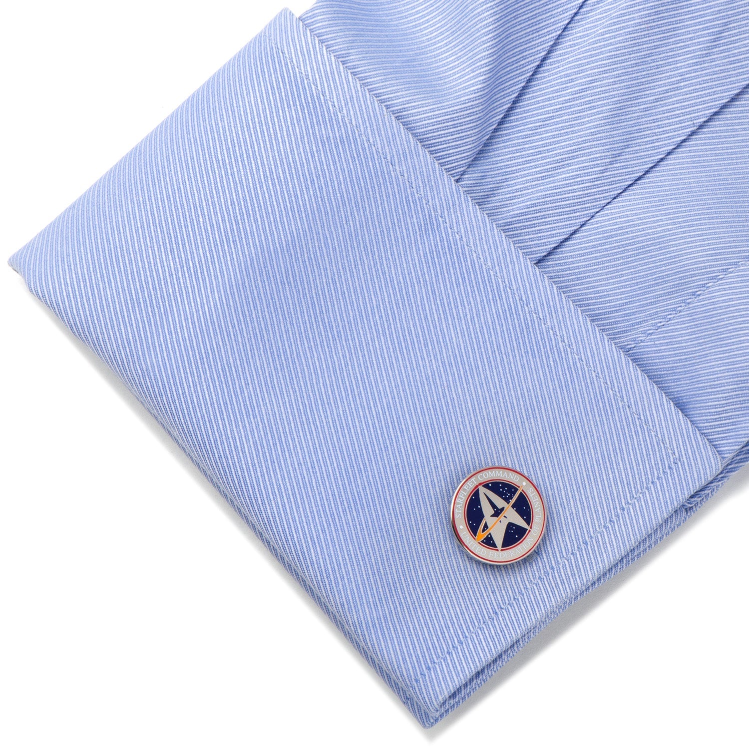Top view of Star Trek Starfleet Command logo cufflinks on a white background