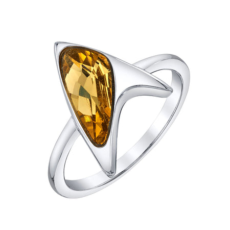 Close-up of the faceted yellow cubic zirconia crystal in Starfleet Delta shape
