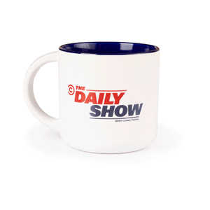 White ceramic coffee mug featuring The Daily Show As Seen On logo printed on the front