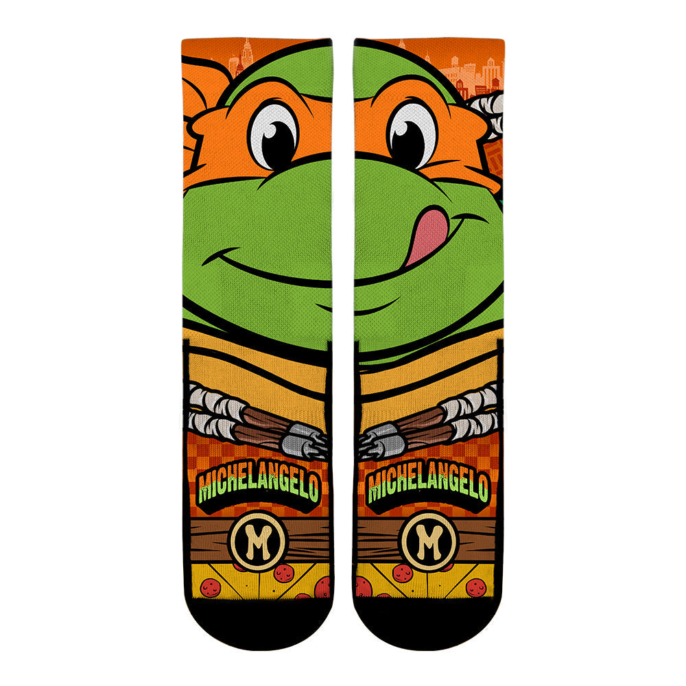 Teenage Mutant Ninja Turtles Michelangelo Split Face Socks showing orange mask design
