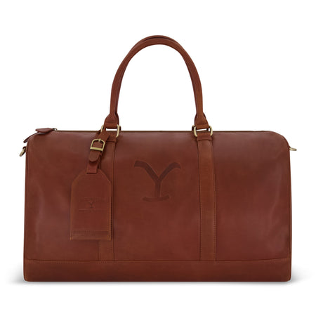 Close-up of Yellowstone leather texture and gold hardware detailing