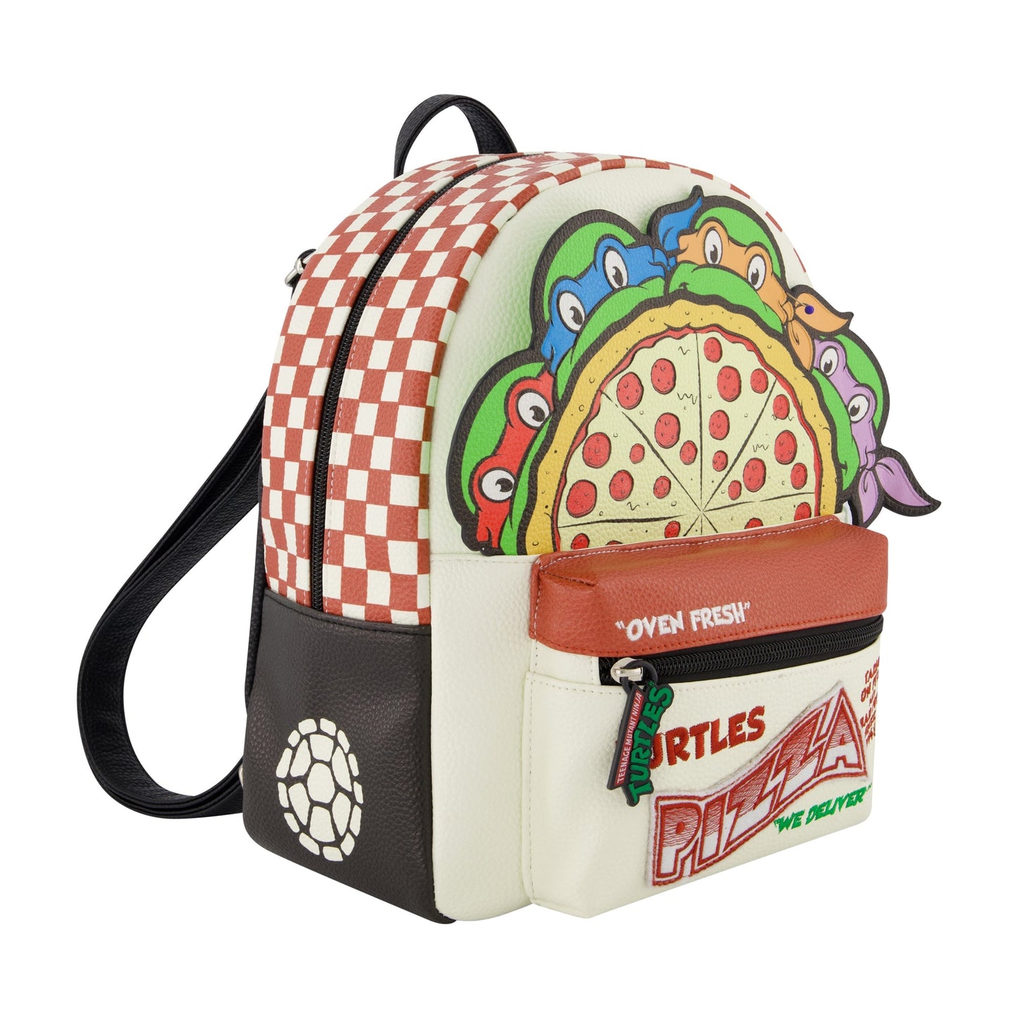 Side profile showing the silver hardware and adjustable shoulder straps of the Turtles mini backpack.