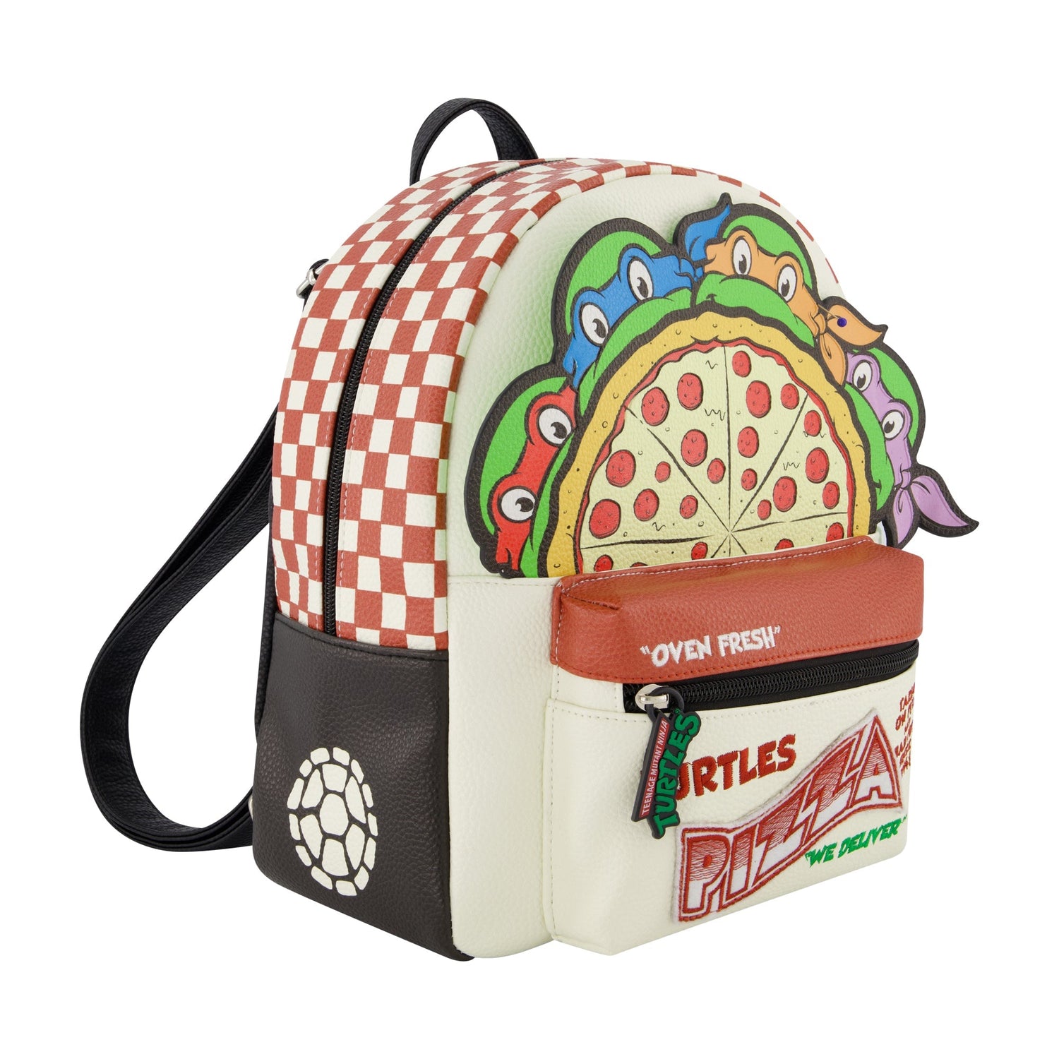 Side profile showing the silver hardware and adjustable shoulder straps of the Turtles mini backpack.